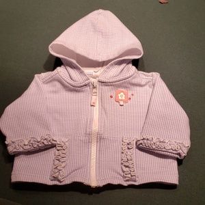 Light weight zippered jacket with hood.